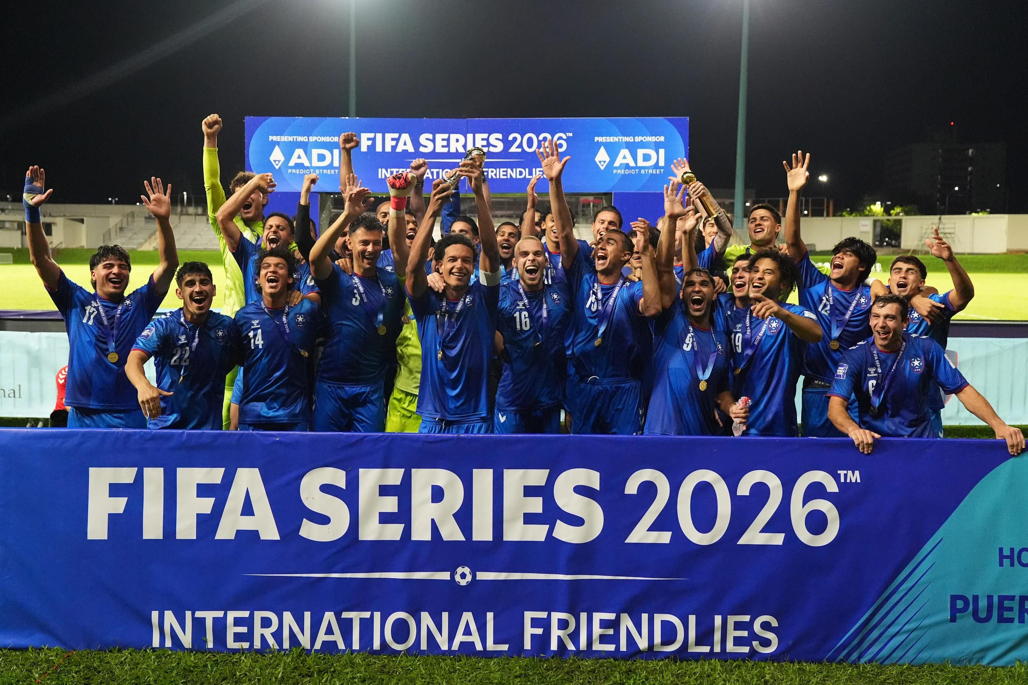 BAYAMON, PUERTO RICO - MARCH 28: Players of Puerto Rico celebrate with the first place trophy after winning the FIFA Series 2026 final match between US Virgin Islands and Puerto Rico at Estadio Juan Ramón Loubriel on March 28, 2026 in Bayamon, Puerto Rico. (Photo by Raul Sifuentes - FIFA/FIFA via Getty Images)